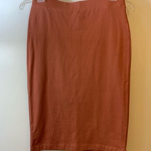 Knee long salmon skirt